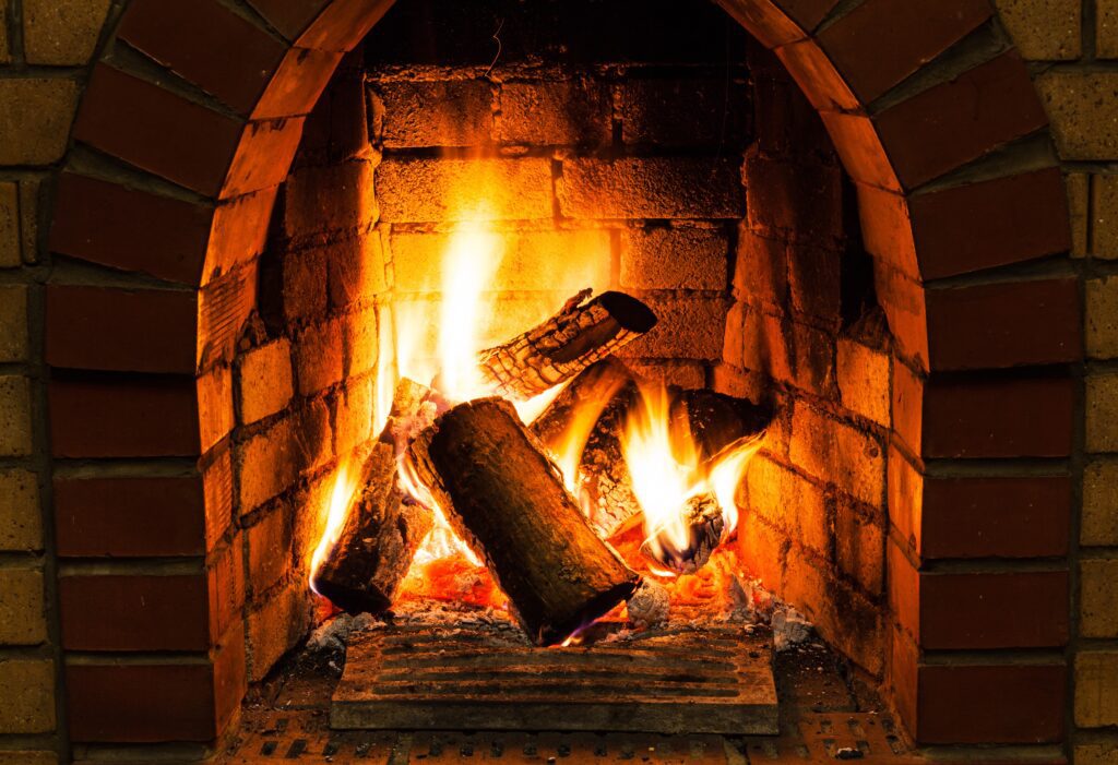 beautiful fireplace with a roaring fire