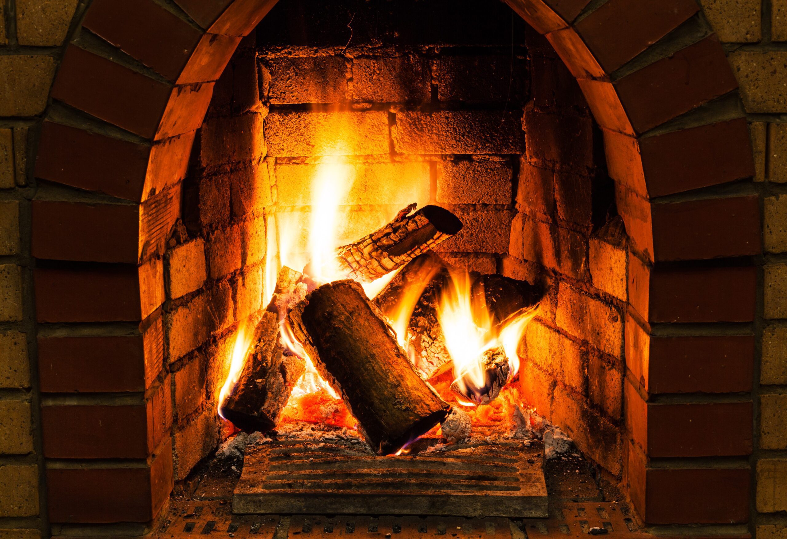 beautiful fireplace with a roaring fire